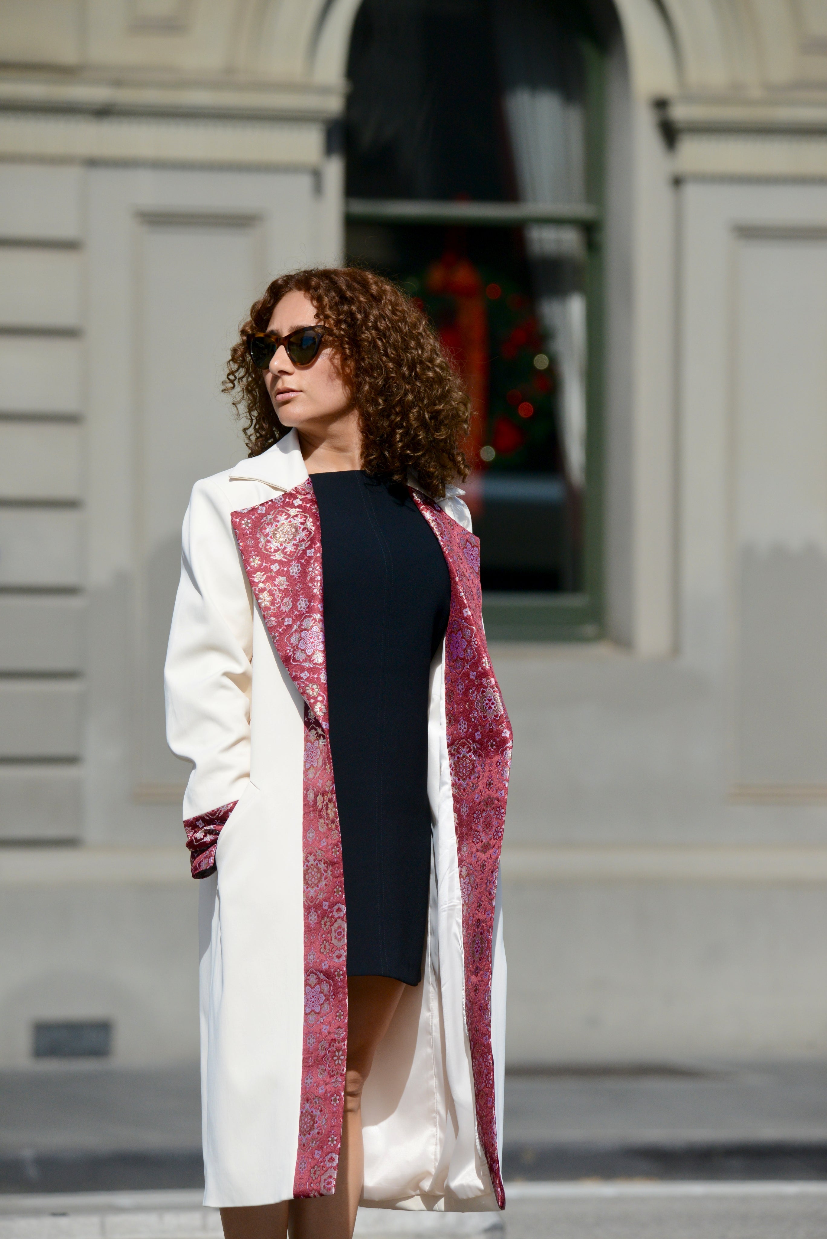 Nora Silk Road jacquard coat from Nastaran - City styled over little black dress